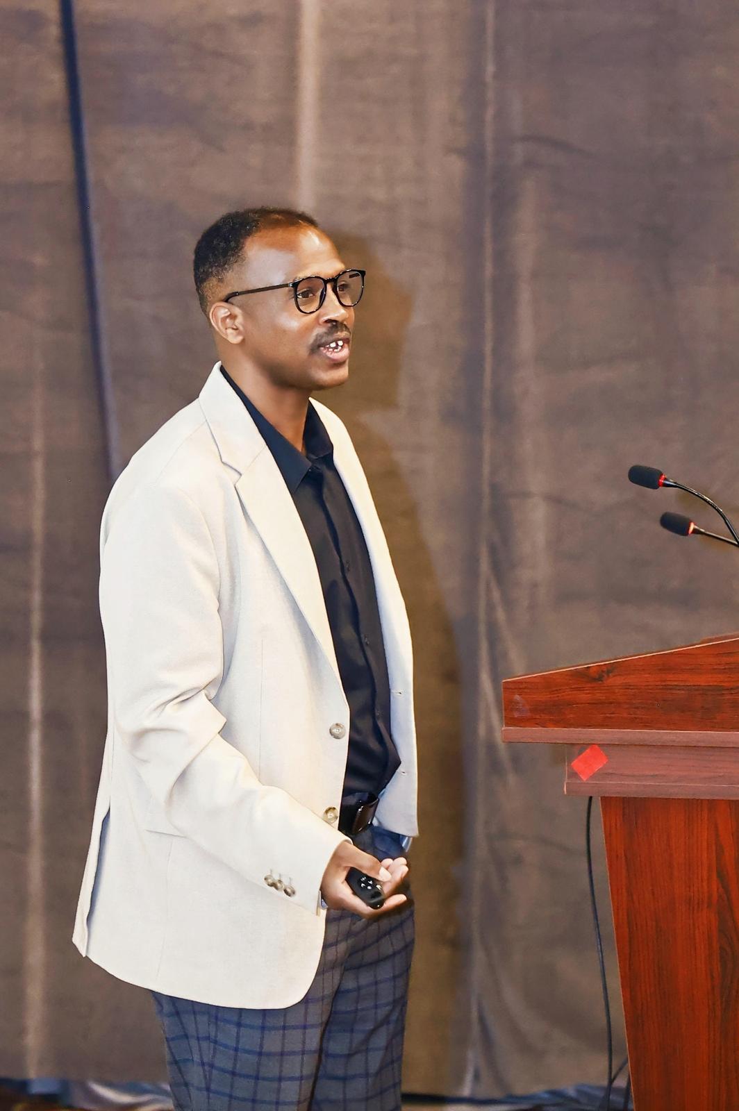Prof. Woldegebriel Assefa Woldegerima celebrating his tenure and promotion to Associate Professor